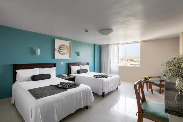 غرفة بسريرين مزدوجين بإطلالة على البحيرة، Don Pelayo Pacific Beach Hotel 1/7