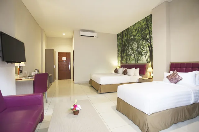 Studio, Triple, 1 Double and 1 Single Bed, Kuta Central Park Hotel 2/10