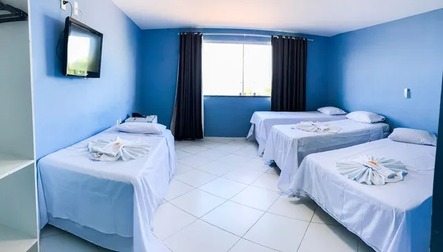 غرفة رباعية بسرير كوين وسريرين منفصلين بإطلالة على البحر، Hotel Luar De Itapua 1/9