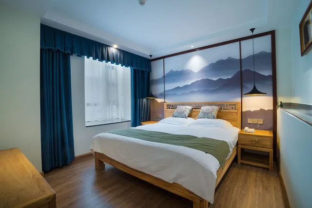 غرفة ديلوكس بسرير كوين، Riverside Inn Guilin Central 1/5