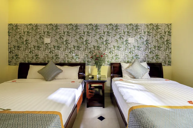 غرفة ديلوكس ثلاثية بسرير مزدوج وسرير فردي بغرفة نوم واحدة، Golden River Hotel 2/6