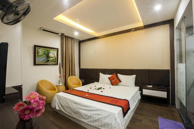 غرفة ديلوكس بسرير كينج وسرير كوين، Nam Long Hotel Ha Noi 2/2