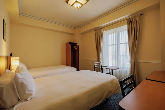 غرفة قياسية بسريرين منفصلين في الطابق العلوي، Hotel Monterey Sendai 1/2