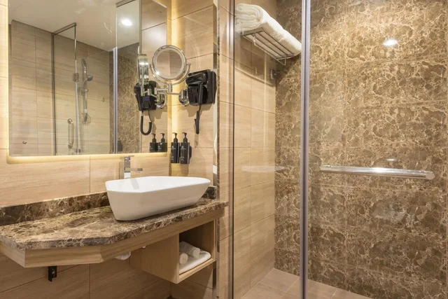 غرفة بسرير فردي بإطلالة على المدينة، La Quinta by Wyndham Abu Dhabi Al Wahda 6/7