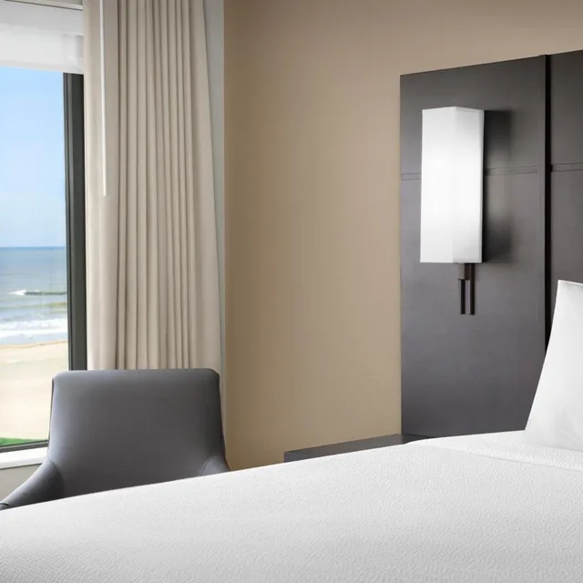غرفة بسرير كينج بإطلالة على البحر بغرفة نوم واحدة مع أريكة، Residence Inn by Marriott Galveston Island 2/6