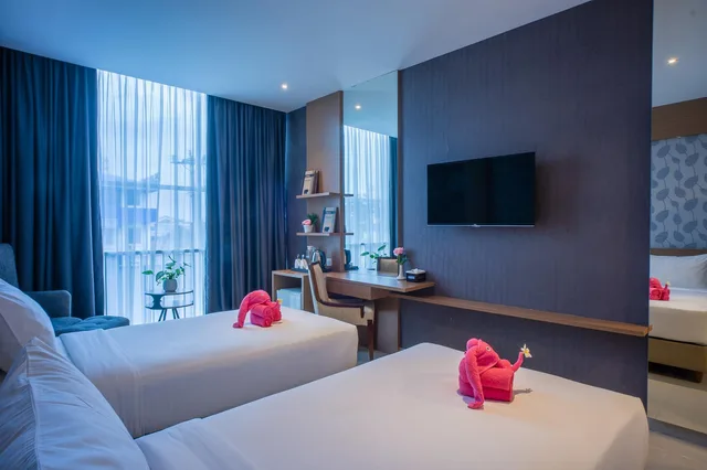 غرفة ديلوكس بسريرين منفصلين، Triizz Hotel Semarang by Royal Singosari (Formerly Faustine Semarang) 2/2