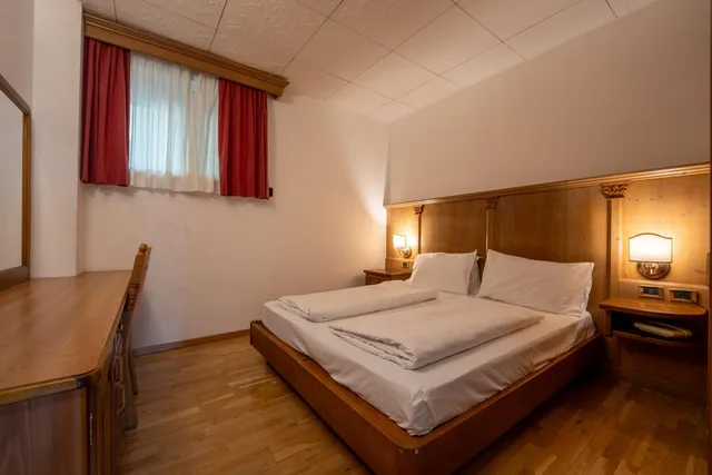 غرفة اقتصادية بسرير مزدوج أو سريرين منفصلين، Schloss Hotel & Club Dolomiti 4/10