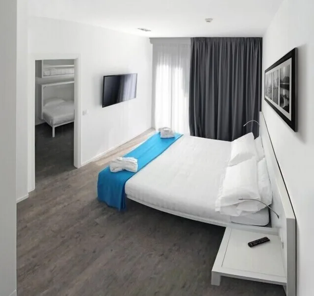 جناح عائلي بسرير كوين وسرير مزدوج وسرير بطابقين، Hotel Europa Monetti 1/3