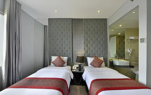 غرفة ديلوكس بسرير مزدوج أو سريرين منفصلين، Serela Cihampelas by KAGUM Hotels 1/1