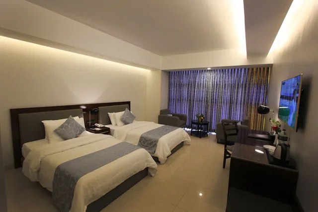 غرفة ديلوكس بسريرين منفصلين، Sky City Hotel Dhaka 1/2