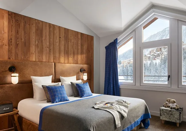 جناح كبير بسرير كينج وسرير فردي مع أريكة، Ecrin Blanc Resort Courchevel 1/2