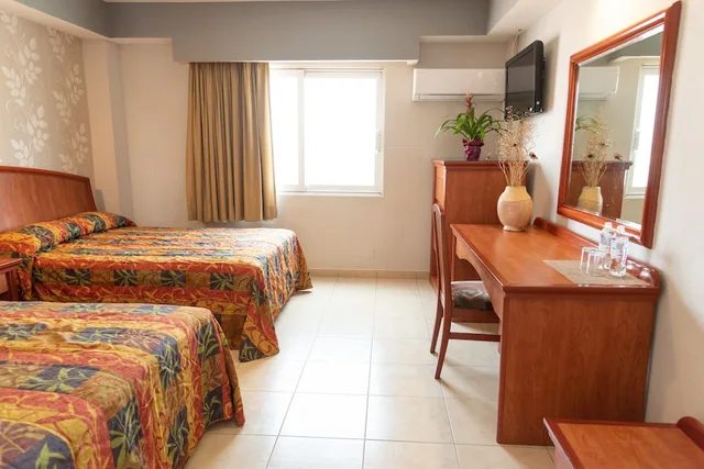 غرفة قياسية بسريرين كوين، Hotel Impala 1/2
