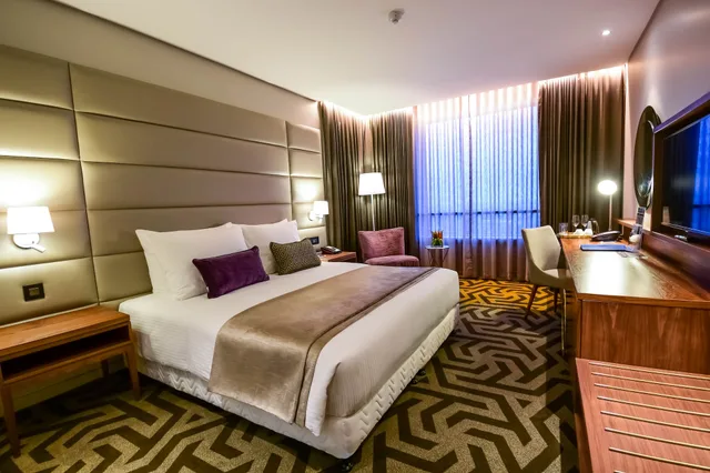 جناح جونيور بسرير كينج، Hotel 2 Fevrier Lome 1/4