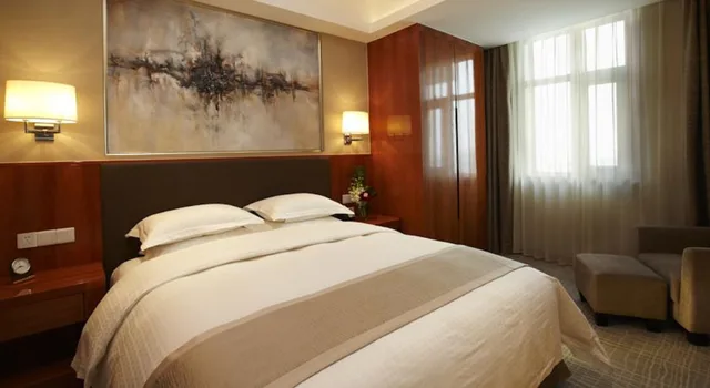 غرفة بزنس بسرير كينج، Ramada Plaza by Wyndham Shanghai Pudong Airport 1/1