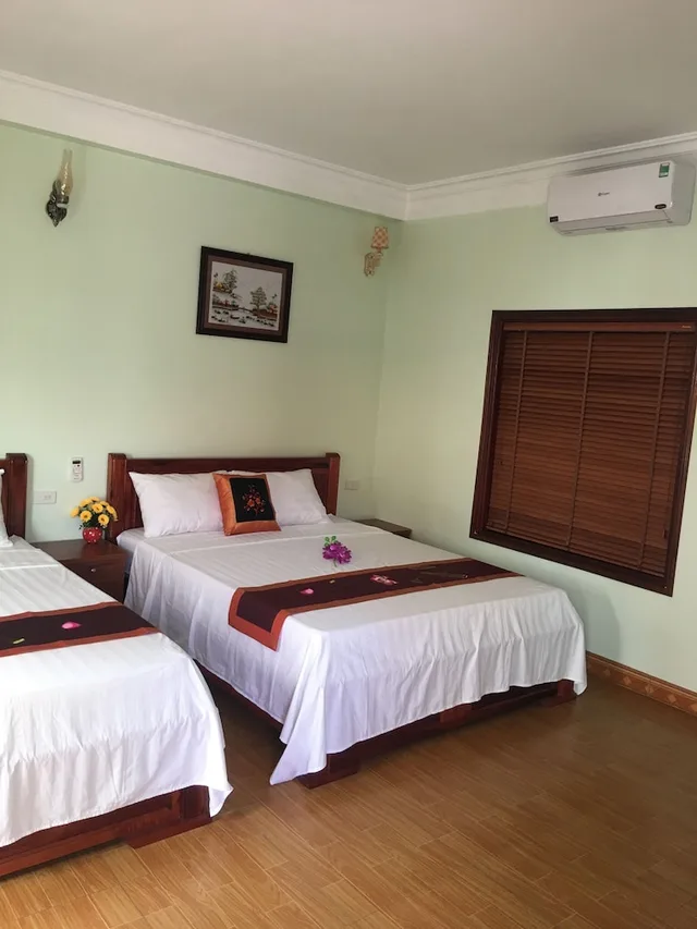 غرفة عائلية بسرير كوين وسرير فردي بشرفة، Tam Coc Tuan Minh Homestay 1/10
