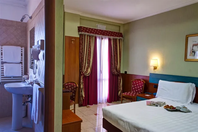 غرفة كلاسيكية بسرير كوين، Hotel Riviera Fiumicino 1/3