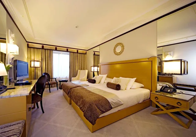 Grand Deluxe Double Room 3 pax، Grande Real Villa Italia Hotel and Spa 1/8