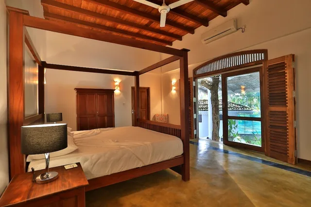 جناح بسرير كينج بإطلالة على المسبح، Amara Villa 2/2