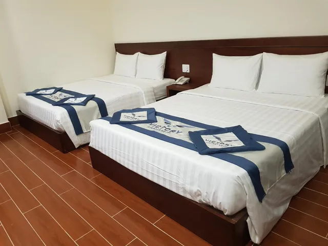 غرفة ديلوكس بسريرين منفصلين وسريرين كينج، Victory Airport Hotel 1/2