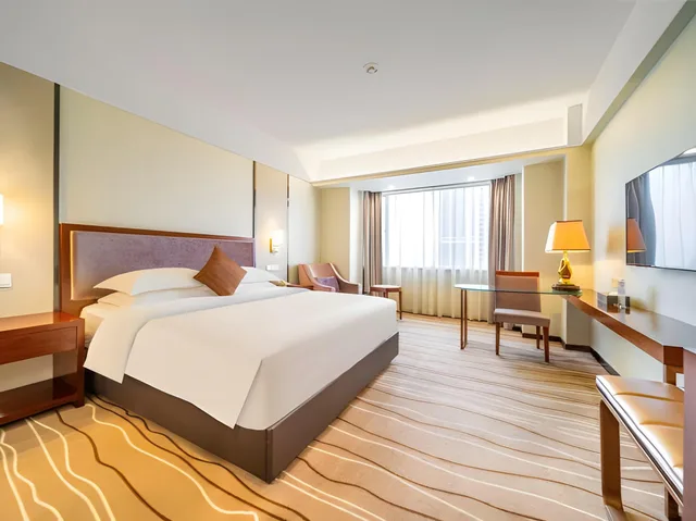 غرفة بزنس بسرير كوين، Zhongshan International Hotel 1/2
