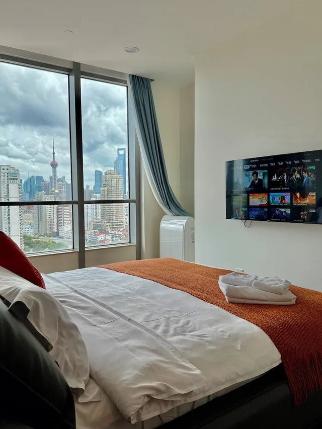 جناح ديلوكس بسريرين كينج بإطلالة على المدينة، River House Near Peoples Square And The Bund 1/5