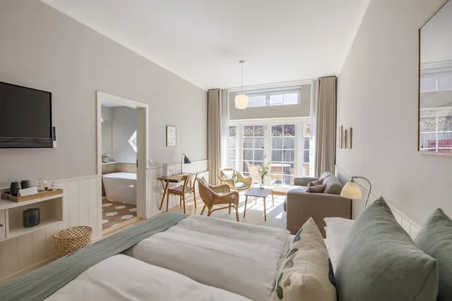 جناح جونيور بسرير مزدوج بحوض استحمام، Ruths Hotel 1/4