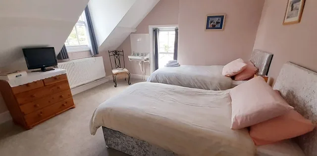 غرفة بسريرين منفصلين بحمام مشترك، The Countryman Hotel - B&B 3/10