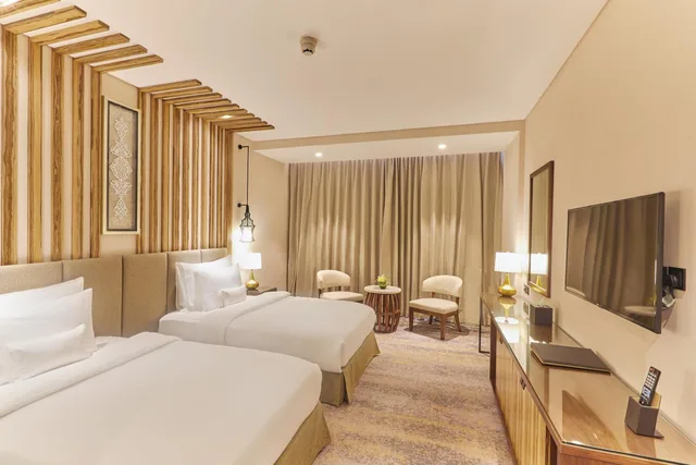 غرفة ديلوكس بسريرين منفصلين، Millennium Resort Salalah 3/5