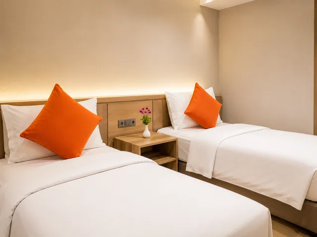 غرفة تنفيذية عائلية بسرير مزدوج وسريرين منفصلين بغرفتي نوم، Grand Tropic Suites Jakarta 1/1