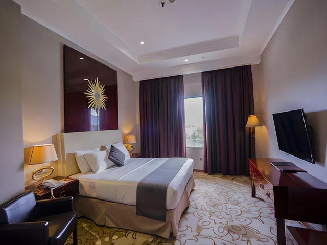 غرفة ديلوكس بسرير كوين، Sutan Raja Hotel And Convention 1/1