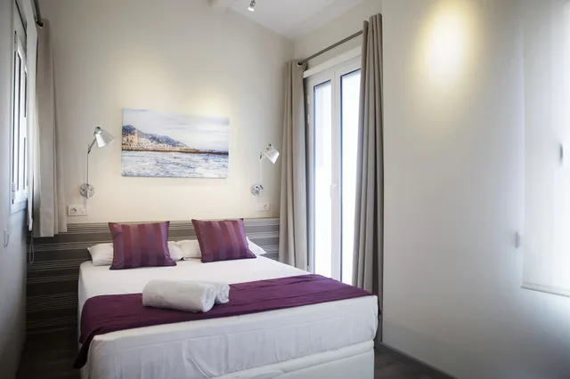 شقة بسرير مزدوج وسريرين منفصلين بشرفة بغرفتي نوم، Mercedes Heritage Barcelona Apartments 3/6
