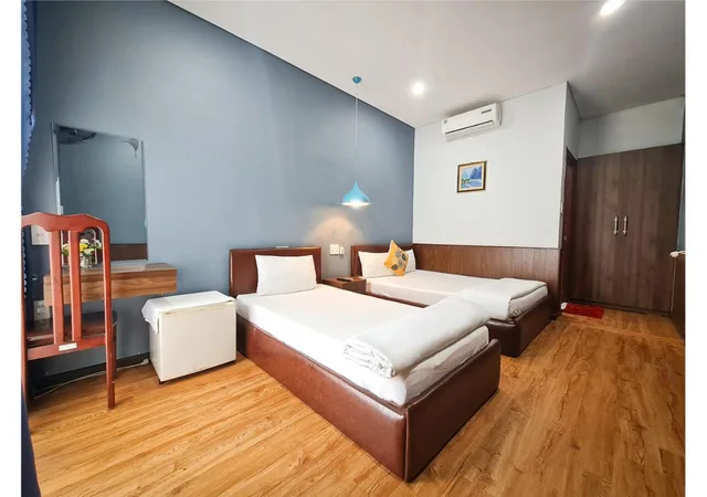 غرفة ثلاثية بسرير كوين وسرير فردي، QUAN QUAN HOTEL 6/7