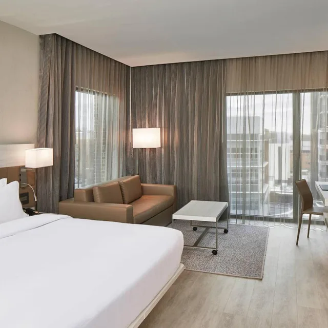 Guest Room, King Bed, City View, Sofa, Corner, AC Hotel by Marriott Greenville 1/3