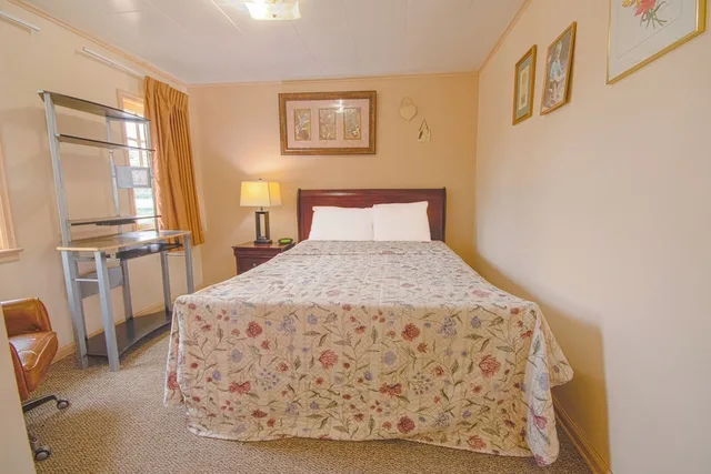 Room, 2 Double Beds, Sunflower Motel Hiawatha By OYO 1/10