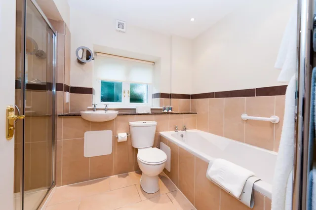 غرفة بسرير كينج في الملحق، Windermere Manor 2/2