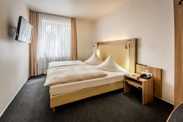 جناح جونيور بسرير كوين مع أريكة، Hotel Lousberg 2/3