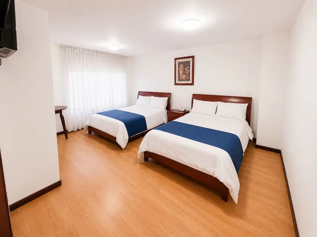 Room, 2 Queen Beds, Nogal Suite Hotel Pasto 3/8