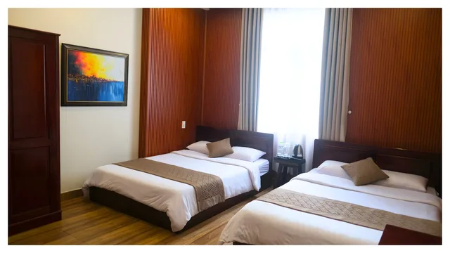 غرفة ديلوكس رباعية بسريرين مزدوجين، Nam Xuan Premium Hotel 1/1