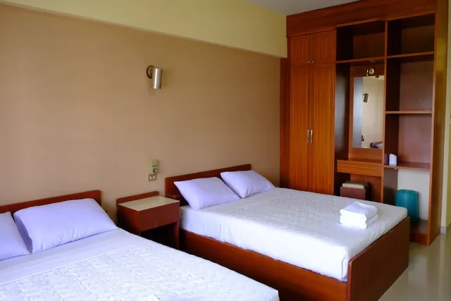 غرفة قياسية رباعية بسريرين مزدوجين، Jor Koo City Hotel 1/3