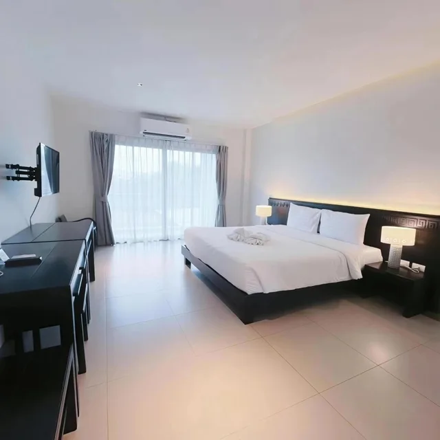 غرفة بسرير مزدوج بإطلالة على المسبح، Phu Ke Ta the Hip Serviced Apartment And Hotel 1/7