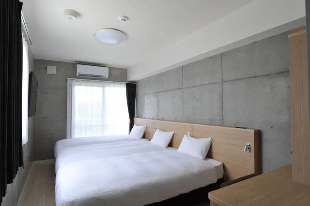 Room, Triple, New Building، The Breakfast Hotel Porto Ishigaki 2/3