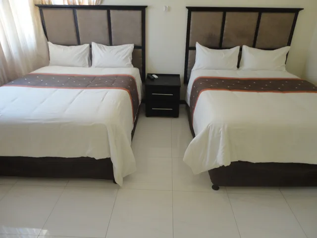 غرفة بسريرين مزدوجين، Global Village Guesthouse 3/5