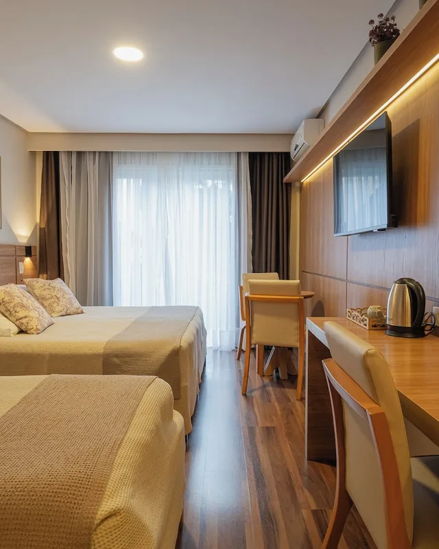 غرفة بسرير مزدوج وسرير فردي، Hotel Pousada Querencia 2/10
