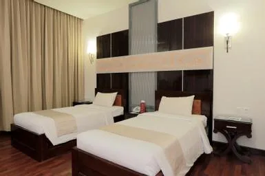 غرفة سوبيريور بسريرين منفصلين، Sutan Raja Hotel & Convention Palu 2/2