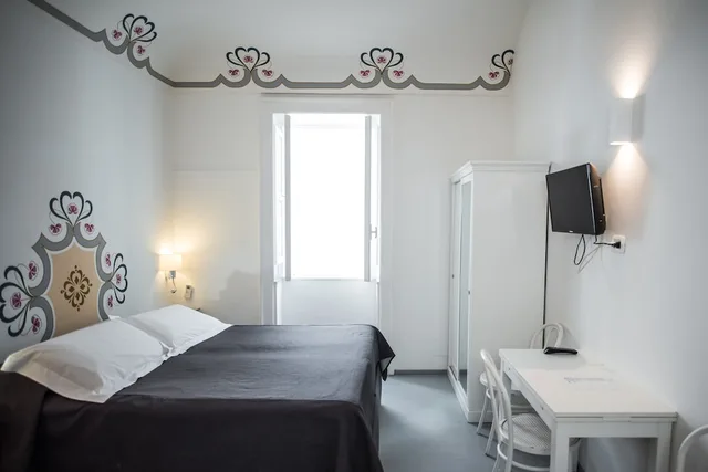 غرفة رباعية بسرير مزدوج وسريرين منفصلين، Aretusa Vacanze 2/5