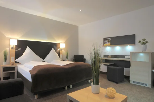 غرفة كومفورت بسرير كوين، Ringhotel Loew S Merkur 1/2