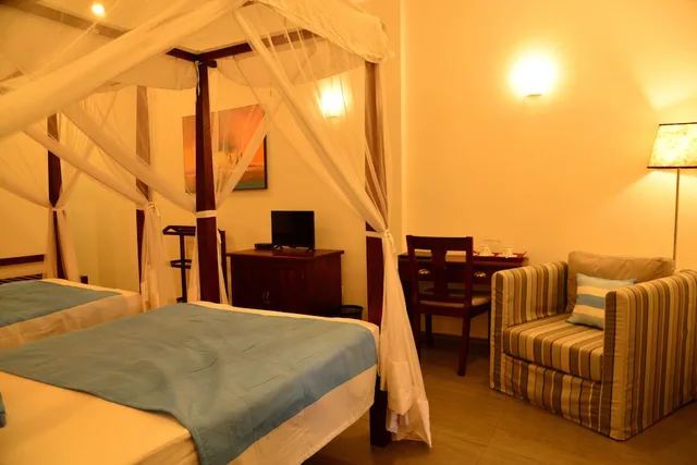 جناح متصل عائلي ديلوكس بسريرين منفصلين وسرير كينج بغرفتي نوم، Villa Shanthi 6/8