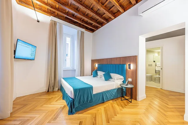 غرفة ديلوكس ثلاثية بسرير كينج وسرير فردي في الملحق، Albergo Abruzzi 1/9
