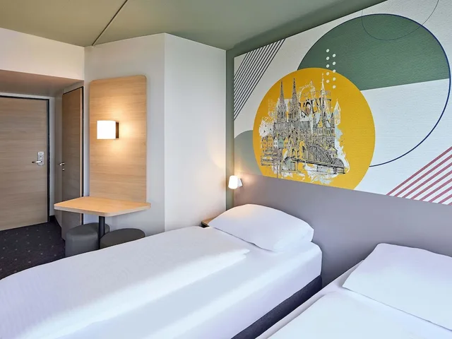 غرفة بسريرين منفصلين، B&B HOTEL Koln-Marsdorf 2/4