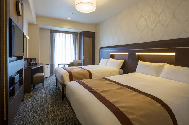 غرفة قياسية بسريرين منفصلين في طابق مرتفع في الطابق العلوي، Hotel Monterey Fukuoka 2/4